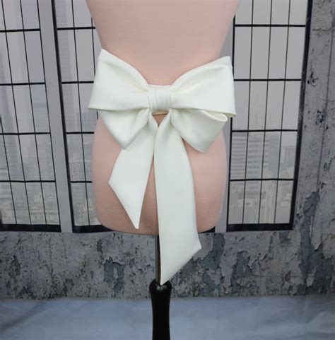 Add an Extra Touch of Elegance to Your Big Day: Get the Perfect Wedding Dress Sash with a Stunning Bow